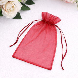 Red organza gift bag with drawstring closure