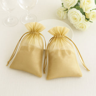 Gold organza drawstring bags for gifts or favors.