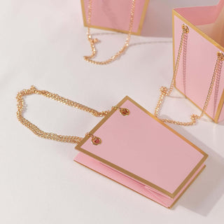 <span>Pink Gold Paper Bags With Metal Chain Handles: A Touch Of Luxury With Practicality</span> <span>Pink Gold Paper Bags With Metal Chain Handles: A Touch Of Luxury With Practicality</span>