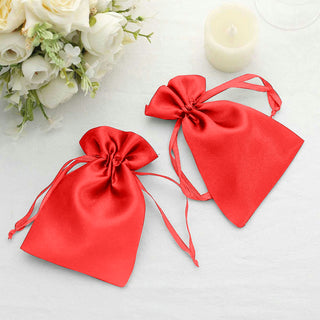 Red satin drawstring bags for gifts or party favors