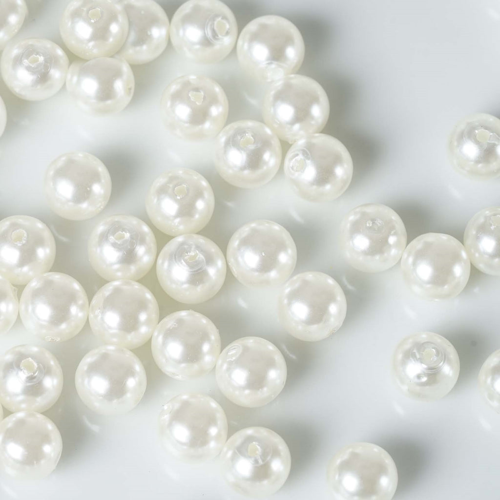 Premium Photo  Nature white pearl beads on sparkling background