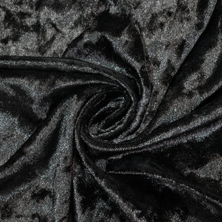 Black plush fabric with a soft, shiny texture. #whtbkgd