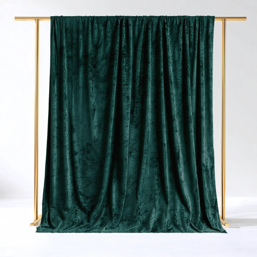 Emerald green velvet backdrop on a gold frame
