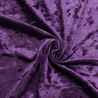 Purple textured fabric swirled in a circular pattern. #whtbkgd