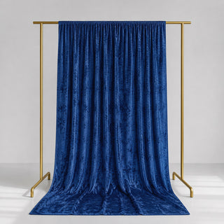 Blue velvet curtain on gold stand backdrop, luxury display backdrop