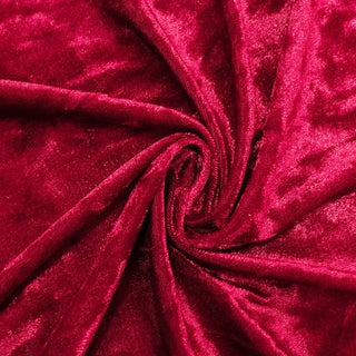 Deep red velvet fabric with a soft, luxurious texture. #whtbkgd