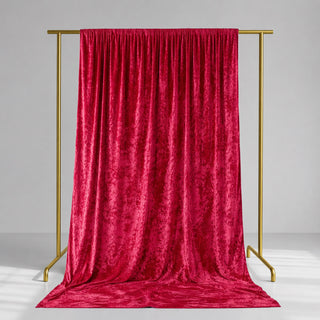 Red velvet curtain on gold backdrop stand, studio product display
