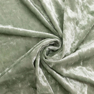 Soft sage green velvet fabric texture with elegant swirl folds#whtbkgd
