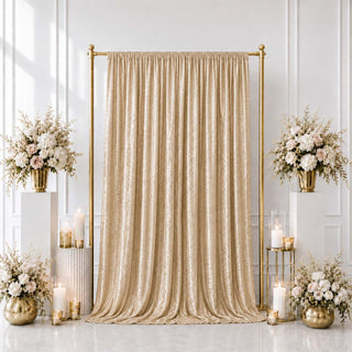 Elegant gold wedding backdrop with champagne curtain and white floral arrangements