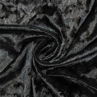 Shiny black velvet fabric texture with elegant spiral folds#whtbkgd