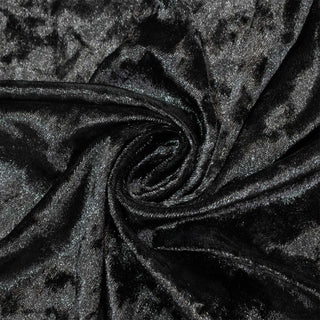 Black shiny velvet fabric texture with swirl folds#whtbkgd