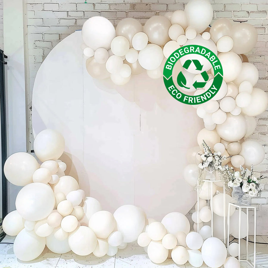 Biodegradable eco-friendly balloon decoration backdrop with white balloons.