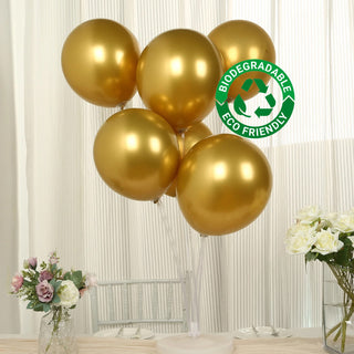 Gold biodegradable balloons in a clear holder with eco-friendly label.