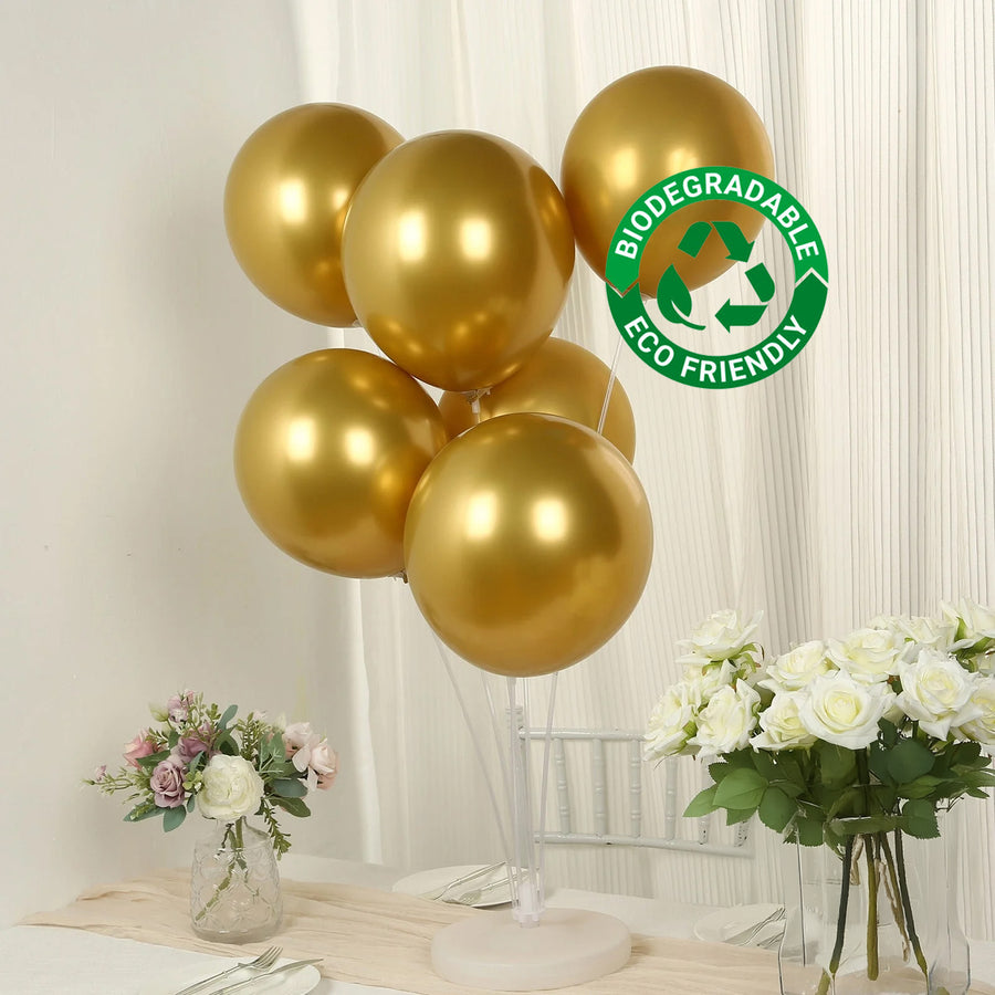 Gold biodegradable balloons in a clear holder, perfect for eco-friendly celebrations.