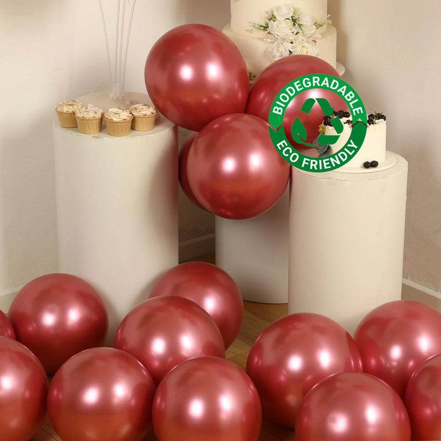 Biodegradable eco-friendly pink balloons arranged in a festive setup.