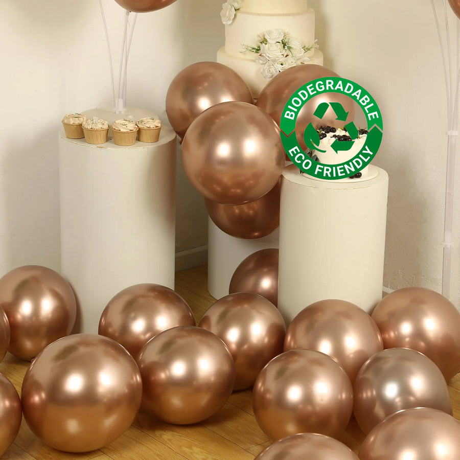 Rose gold biodegradable balloons with eco-friendly seal in a festive setting.