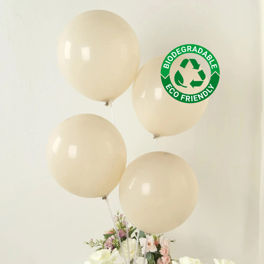 Biodegradable eco-friendly beige balloons on a plain background.