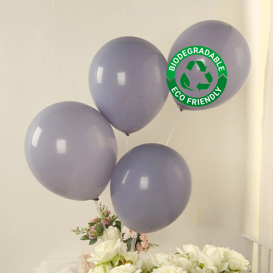 Eco-friendly biodegradable lavender balloons with decorative greenery.