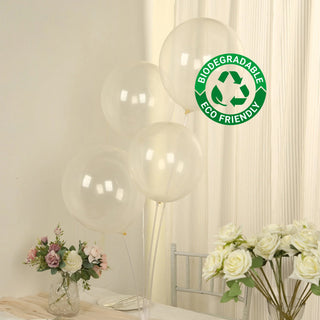 Biodegradable clear balloons with eco-friendly label in a soft setting.