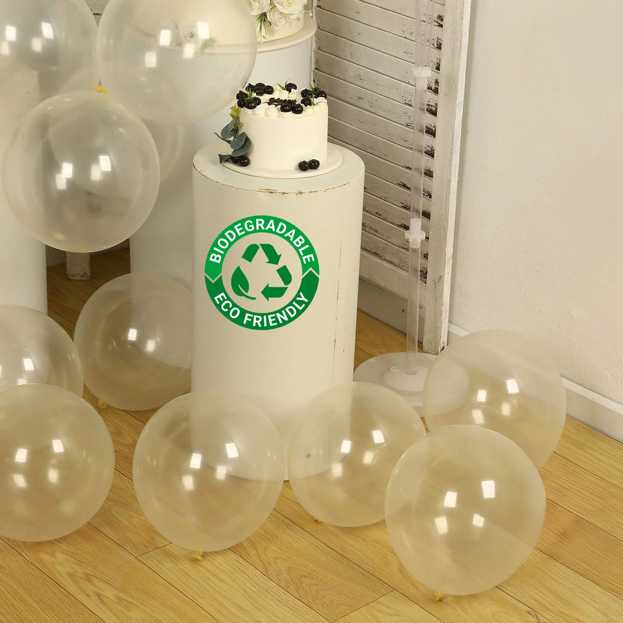 Biodegradable eco-friendly balloons around a cake display.