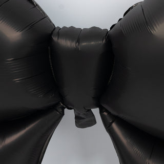 Black balloon bow decoration for parties and events