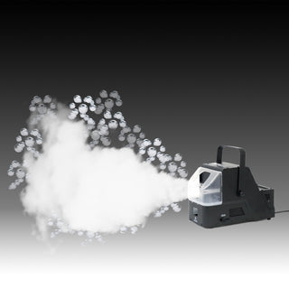 Fog machine producing mist with reflective particles in the air.