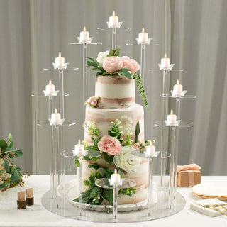 Wedding cake with floral decorations and candle holders.