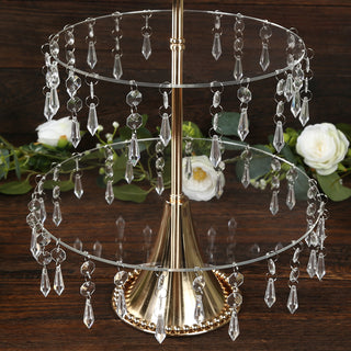 Elegant two-tier crystal cupcake stand with decorative beads.