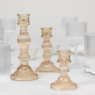 Amber Gold Ribbed Glass Taper Candlestick Holders: A Statement of Sophistication Amber Gold Ribbed Glass Taper Candlestick Holders: A Statement of Sophistication
