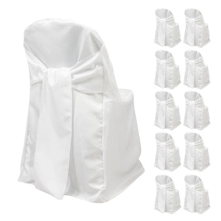 White chair covers with bow, set of ten, studio shot.