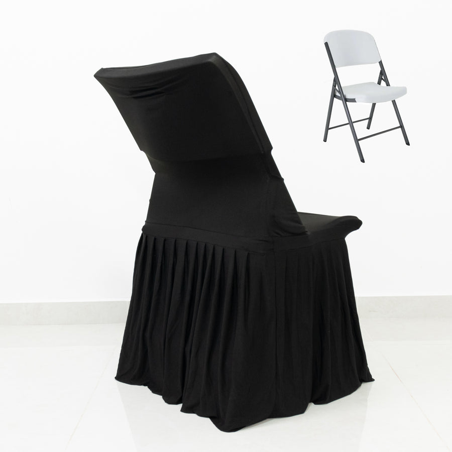 Black chair cover with pleats on a folding chair