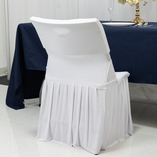 White banquet chair cover draped elegantly over a chair at a dining table.