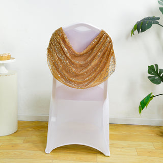 Gold sequin shawl draped over a white chair.