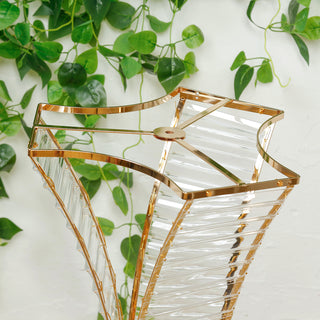 Elegant gold and crystal decorative lamp with geometric design.