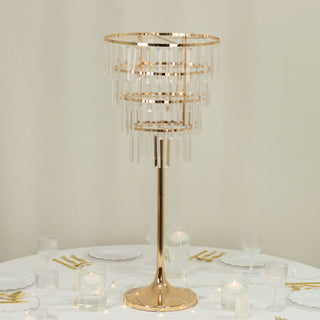 Elegant gold table lamp with crystal accents on a dining table setting.