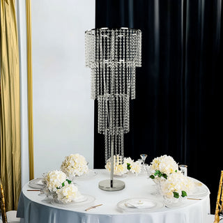 Elegant crystal chandelier lamp on a dining table with floral decor.