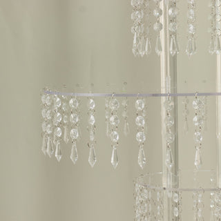Crystal chandelier with hanging prisms and elegant design.