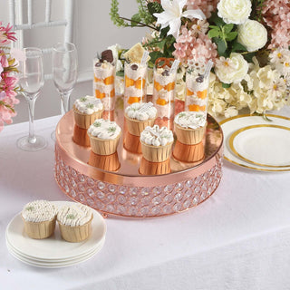 Elegant dessert display with cupcakes and parfaits on a stylish round tray.