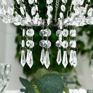 Elegant crystal chandelier with sparkling prisms and decorative chains.