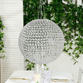 Crystal globe chandelier with a silver finish, hanging decoratively.