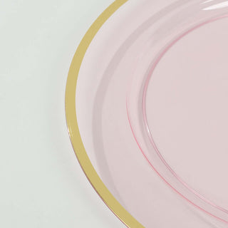 Pink plate with a gold trim on a white background
