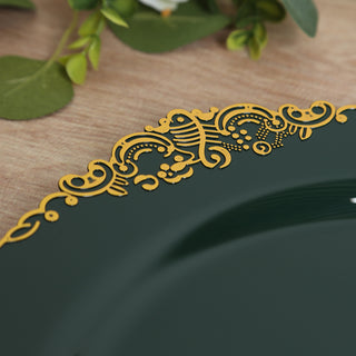 Elegant green plate with intricate gold detailing on the rim.