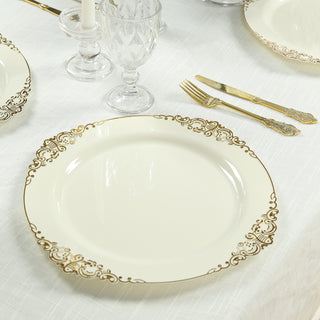 <strong>Ivory Plastic Charger Plates With Gold Embossed Baroque Rim Design</strong> <strong>Ivory Plastic Charger Plates With Gold Embossed Baroque Rim Design</strong>