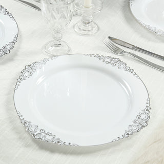 <strong>White Plastic Charger Plates With Silver Embossed Baroque Rim Design</strong> <strong>White Plastic Charger Plates With Silver Embossed Baroque Rim Design</strong>