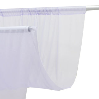 Sheer white curtain with lavender top hem on a silver rod