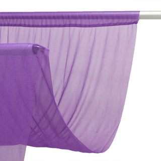 Purple sheer window curtain panel hanging on a silver rod