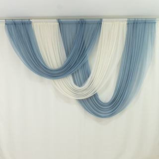 Blue and white draped sheer curtains