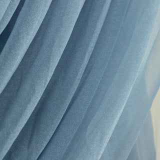 Blue chiffon fabric draping with soft, flowing texture.