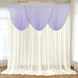 Sheer lavender curtain drapery over light cream backdrop in a bright interior.
