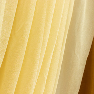 Sheer yellow fabric with a shimmering texture.